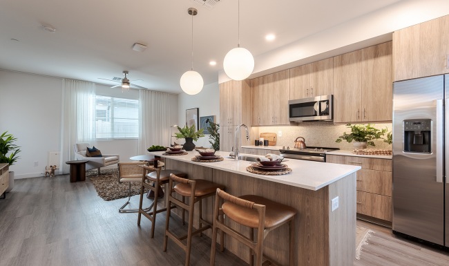 a kitchen with a large prep island