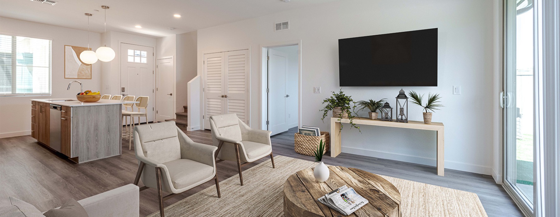 a stylish living area with large windows